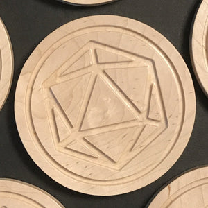 Maple coaster with engraving of 20-sided die (D20)